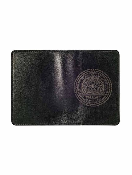 Обложка черного цвета с гравировкой всевидящее око в развороте.