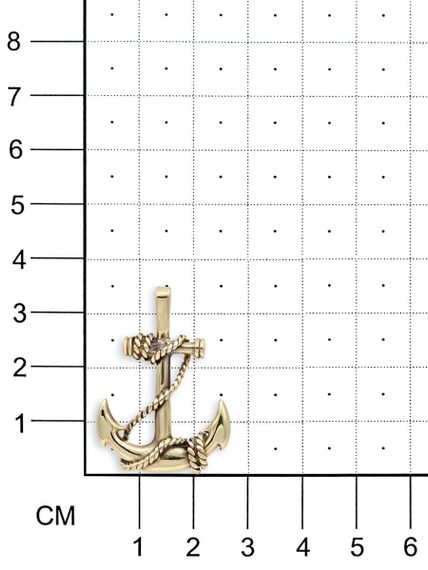 Фото подвески якорь из бронзы, вид на размерной сетке.