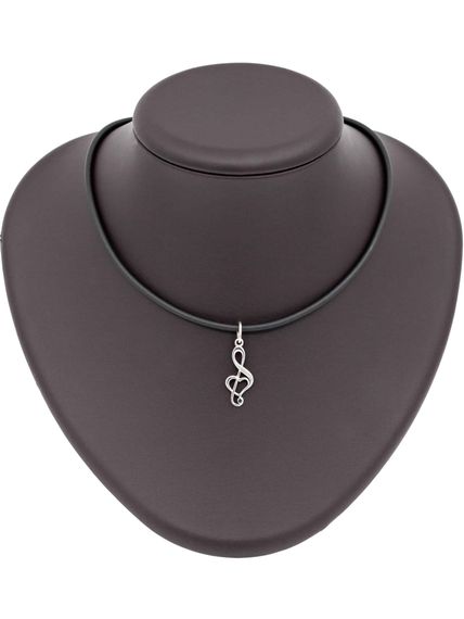 Фото кулона Скрипичный ключ из серебра, вид на постаменте на белом фоне.