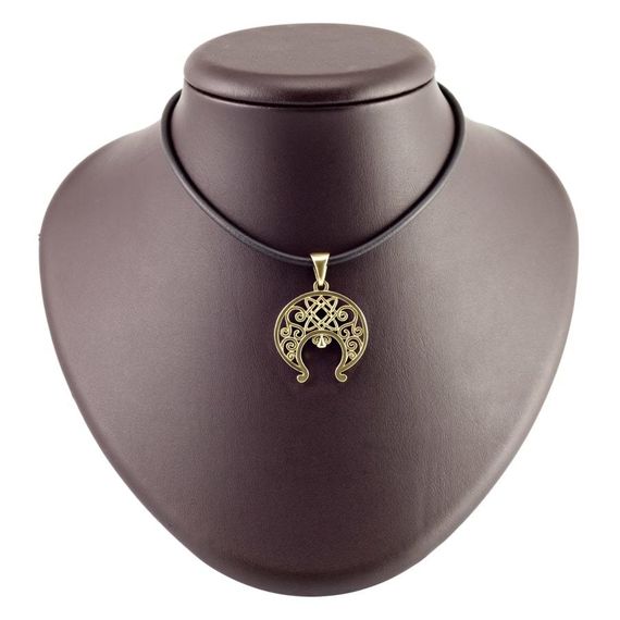 Фотография лунницы Лады из бронзы на постаменте.