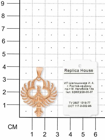 Кулон птица Феникс из серебра с позолотой фото на размерной сетке.