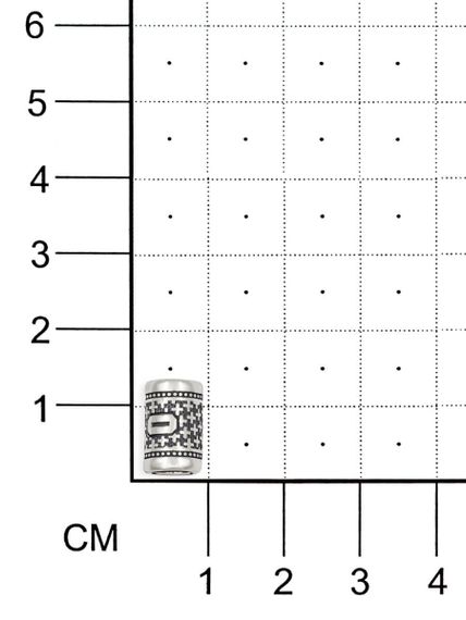 Фото шарм цифра 0 из серебра на размерной сетке