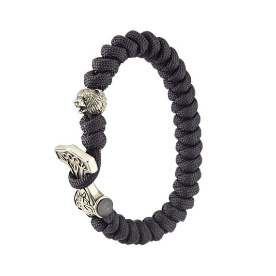 Фото браслета с шармами молот Тора и медведь на перевернутый.