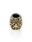 Фото бусины череп Tribal skull из мельхиора на белом фоне, вид слева.