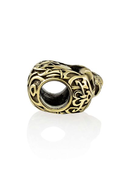 Фото на боку, вид сзади на отверстие 5 мм  бронзовой бусины череп Tribal skull.