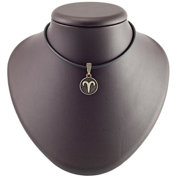 Фото на постаменте Овен знак зодиака из бронзы в масштабе.