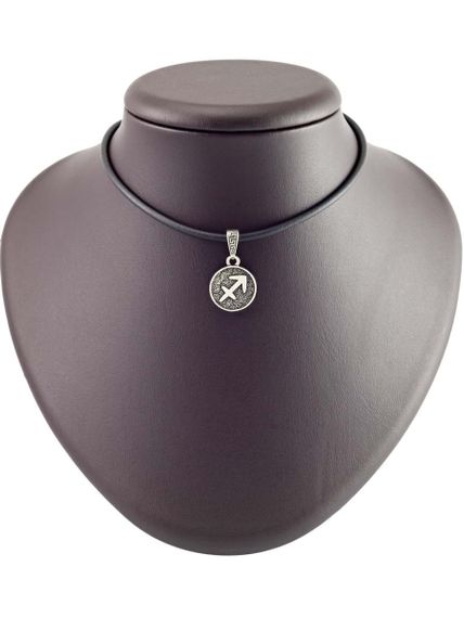 Фото зодиака стрелец из мельхиора на постаменте.