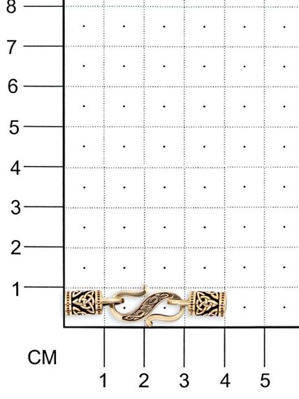 Фото фурнитура замок для гайтана из бронзы под шнур 3 мм, вид на размерной сетке.