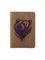 Обложка для паспорта с гравировкой в виде головы Медведя коричневого цвета в сложенном виде на белом фоне.