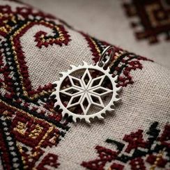 Алатырь в солнце подвеска из серебра