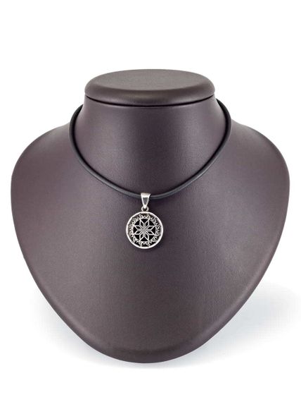 Купить подвеску Алатырь в солнце из серебра, фото на постаменте.