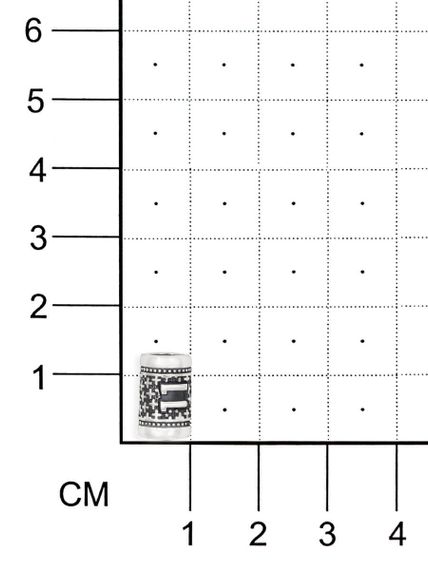Фото шарм цифра число 11 из серебра на размерной сетке