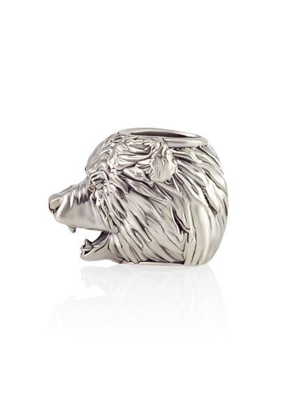 Фото бусина медведь из серебра, вид слева.